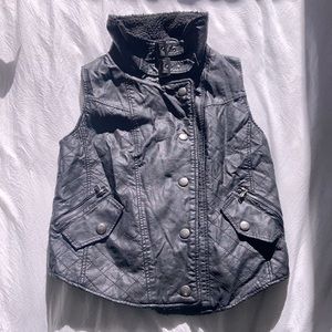 Faux leather and shearling vest